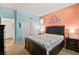 Guest bedroom with coastal decor, double bed, and a coral wall at 685 Sea Star St, Henderson, NV 89002