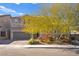 Two-story home with attached garage and mature trees at 685 Sea Star St, Henderson, NV 89002