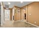 A well-lit hallway showcasing laundry and bathroom access at 685 Sea Star St, Henderson, NV 89002