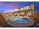 Relaxing backyard oasis with a sparkling pool and hot tub at 685 Sea Star St, Henderson, NV 89002