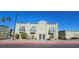 Building exterior showcasing Spanish-style architecture and a two-story design at 7090 Burcot Ave # B32, Las Vegas, NV 89156