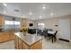 Spacious kitchen with island, wood cabinets, and ample counter space at 7182 Hood River Ave, Las Vegas, NV 89179