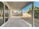 Covered back patio area with concrete flooring and view of the backyard space and block wall fencing at 7900 Holly Knoll Ave, Las Vegas, NV 89129