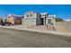 Two-story house with three-car garage and street view at 7900 Holly Knoll Ave, Las Vegas, NV 89129