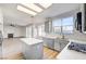 Modern kitchen with gray cabinets, quartz counters, and island at 7900 Holly Knoll Ave, Las Vegas, NV 89129