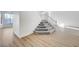 Gray-carpeted staircase with white railing at 7900 Holly Knoll Ave, Las Vegas, NV 89129