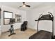 Home gym with treadmill, exercise bike, and massage chair at 803 Bolide St, Las Vegas, NV 89138