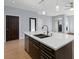 Modern kitchen with white quartz countertops and stainless steel appliances at 8925 W Flamingo Rd # 213, Las Vegas, NV 89147