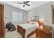 Main bedroom with antique bed frame and ceiling fan at 900 Mckinley View Ave, Henderson, NV 89012