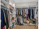 Large walk-in closet with ample shelving and hanging space at 900 Mckinley View Ave, Henderson, NV 89012