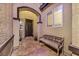 Entryway with tiled flooring and a wooden bench at 900 Mckinley View Ave, Henderson, NV 89012