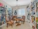 Spacious library featuring built-in bookshelves and comfortable seating at 900 Mckinley View Ave, Henderson, NV 89012