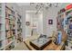 Library with built-in shelves, showcasing a hallway view at 900 Mckinley View Ave, Henderson, NV 89012