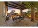 Relaxing covered patio with table and chairs at 900 Mckinley View Ave, Henderson, NV 89012