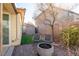 Patio with fire pit and artificial turf at 968 Mill Run Creek Ave, Henderson, NV 89002