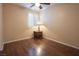 Bright bedroom with wood floors and a large window at 968 Mill Run Creek Ave, Henderson, NV 89002