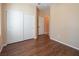 Bright bedroom with wood floors and a double door closet at 968 Mill Run Creek Ave, Henderson, NV 89002