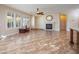 Living room with fireplace, large windows, and tile flooring at 968 Mill Run Creek Ave, Henderson, NV 89002