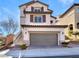 Charming two-story home featuring a two-car garage and neutral stucco exterior with lovely contrasting accents at 10809 Wrigley Field Ave, Las Vegas, NV 89166