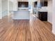 Modern kitchen boasts stainless steel appliances, a large island, and sleek dark cabinetry at 10809 Wrigley Field Ave, Las Vegas, NV 89166
