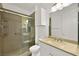 Updated bathroom with walk-in shower and modern vanity at 10920 Grand Haven Ave, Las Vegas, NV 89134