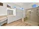 Bathroom boasts double vanity, large shower, and linen cabinets at 10920 Grand Haven Ave, Las Vegas, NV 89134