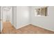 Small bedroom with tile floors and access to a closet at 10920 Grand Haven Ave, Las Vegas, NV 89134