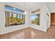 Bright dining room with tile floors and view to backyard at 10920 Grand Haven Ave, Las Vegas, NV 89134