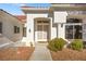 Front entry with double doors and sidelights, and a walkway at 10920 Grand Haven Ave, Las Vegas, NV 89134