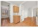 Hallway with built-in cabinets and wood floors at 10920 Grand Haven Ave, Las Vegas, NV 89134