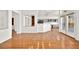 Open concept living room with hardwood floors and kitchen views at 10920 Grand Haven Ave, Las Vegas, NV 89134