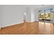 Bright living room with hardwood floors and sliding glass doors leading to a patio at 10920 Grand Haven Ave, Las Vegas, NV 89134
