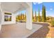 Covered patio with mountain views and desert landscaping at 10920 Grand Haven Ave, Las Vegas, NV 89134