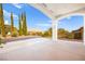 Covered patio with mountain views and desert landscaping at 10920 Grand Haven Ave, Las Vegas, NV 89134