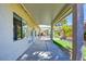 Covered patio overlooks home's backyard at 1140 Woodcastle St, Henderson, NV 89052
