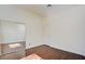 Bedroom features wood floors, closet with sliding mirrored doors and natural light at 1140 Woodcastle St, Henderson, NV 89052