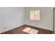 Bedroom features a window for natural light, hardwood floors and closet with mirrored doors at 1140 Woodcastle St, Henderson, NV 89052
