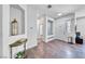 Bright entryway with wood floors and decorative accents at 1140 Woodcastle St, Henderson, NV 89052