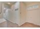 Hallway with tile flooring and white doors at 1140 Woodcastle St, Henderson, NV 89052