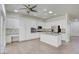 Modern kitchen with white cabinets, stainless steel appliances, and ample counter space; perfect for cooking at 1140 Woodcastle St, Henderson, NV 89052