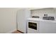 Bright laundry area with modern appliances at 1140 Woodcastle St, Henderson, NV 89052
