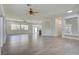 Large living room with lots of natural light and tile flooring at 1140 Woodcastle St, Henderson, NV 89052