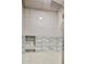 Tiled shower featuring a niche and modern showerhead at 1140 Woodcastle St, Henderson, NV 89052