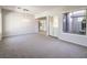 Spacious dining room with carpet flooring and chandelier at 12 Fallows Fire Ct, Henderson, NV 89052