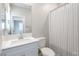 Clean bathroom with white vanity, quartz countertop, and shower/tub at 1348 Mariposa Way, Mesquite, NV 89027