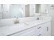 Double vanity bathroom with white quartz countertops at 1348 Mariposa Way, Mesquite, NV 89027
