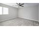 Bright bedroom with ceiling fan and neutral wall colors at 1348 Mariposa Way, Mesquite, NV 89027
