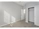 Well-lit bedroom with carpet flooring and sliding door closet at 1348 Mariposa Way, Mesquite, NV 89027