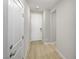 Light and airy entryway with wood-look flooring and neutral walls at 1348 Mariposa Way, Mesquite, NV 89027