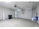 Attached garage with overhead door and epoxy floor at 1348 Mariposa Way, Mesquite, NV 89027